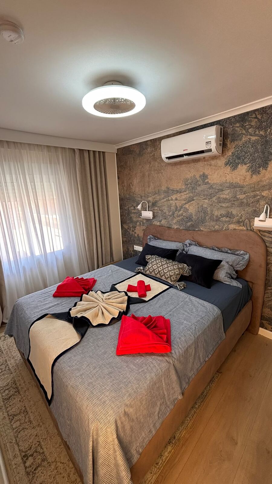 Second bedroom with decorative wallpaper
